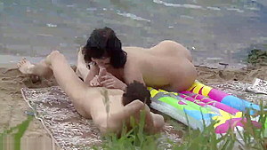 Young couple making sex on the beach